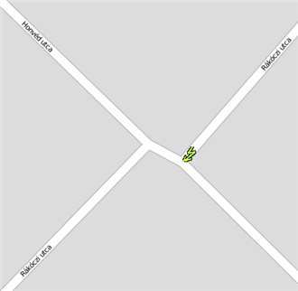 Egy keresztutca eltolással csatlakozik egy utca két oldalához. Az eltolásnál KeepRight figyelmeztetési villám ikon látható.